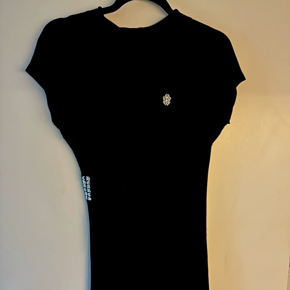 Short sleeve, turtle neck black dress. Hits right above the knees